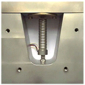 Fig. 8: Preloading frame for dynamic testing of PICMA® stack actuators. The threaded holes allow the addition of covers to test different cooling measures or remove convection cooling altogether.